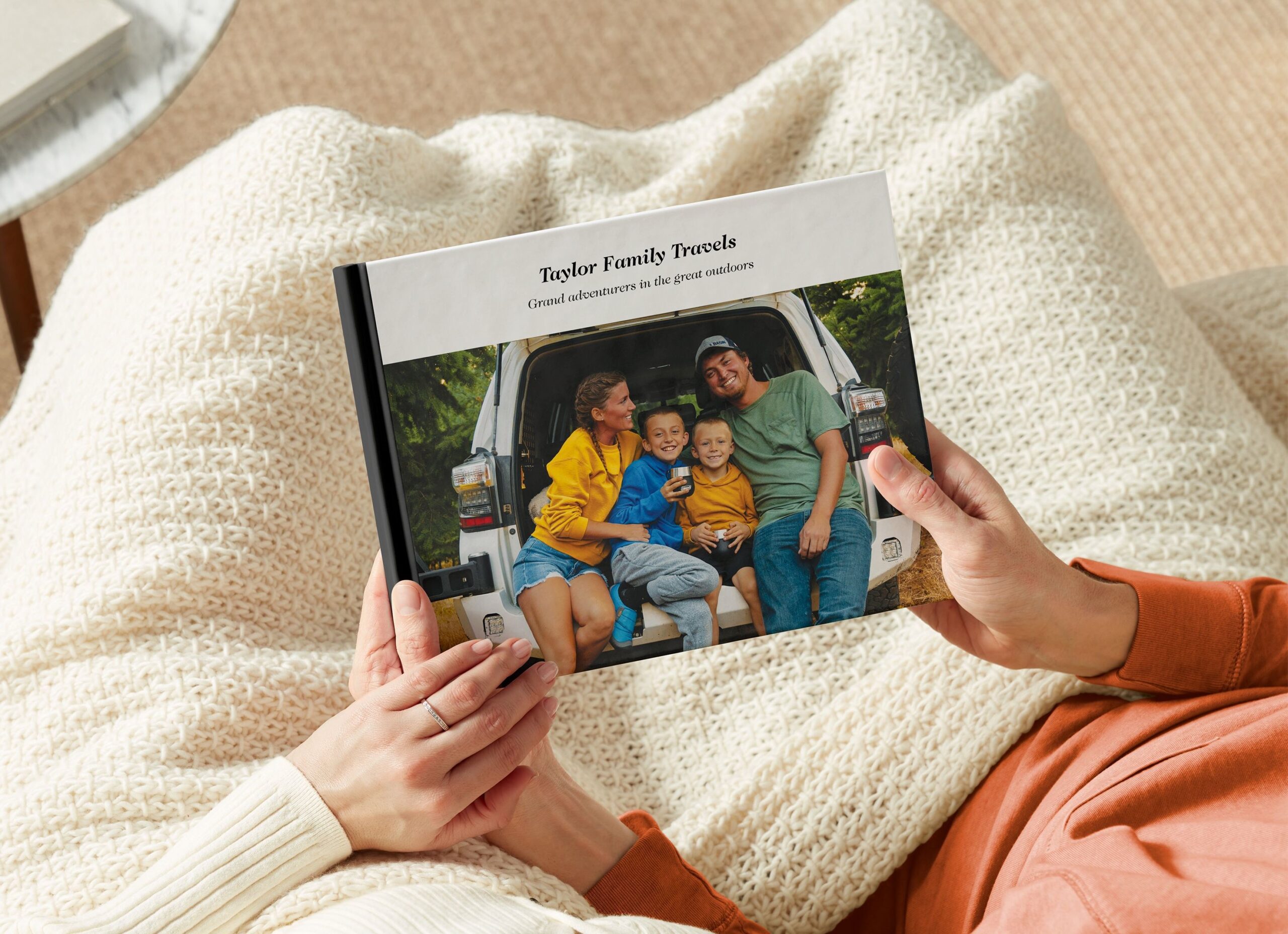 travel photo book with a family vacation on the cover
