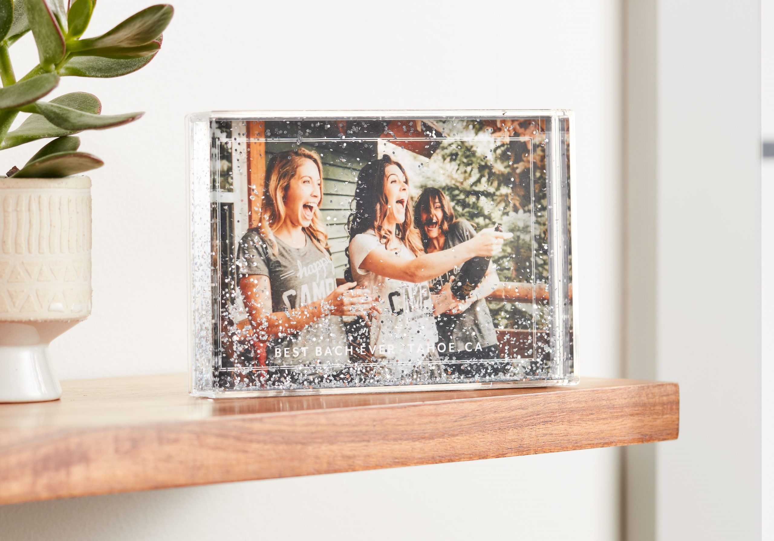 Custom glitter picture frame with a photo of girls celebrating a bachelorette party