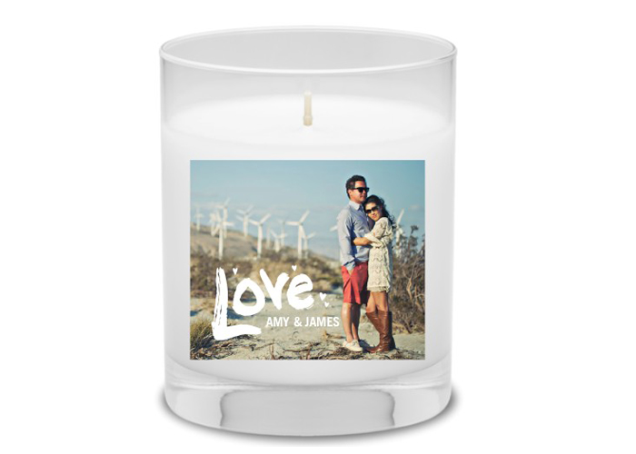 A personalized candle with a photo and the word love for valentine's day